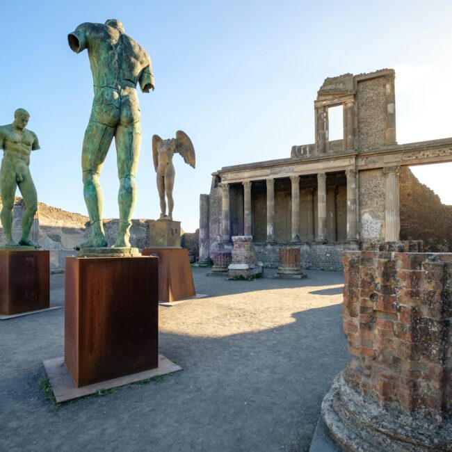 Scenic view of ruins and statues in ancient city of Pompeii